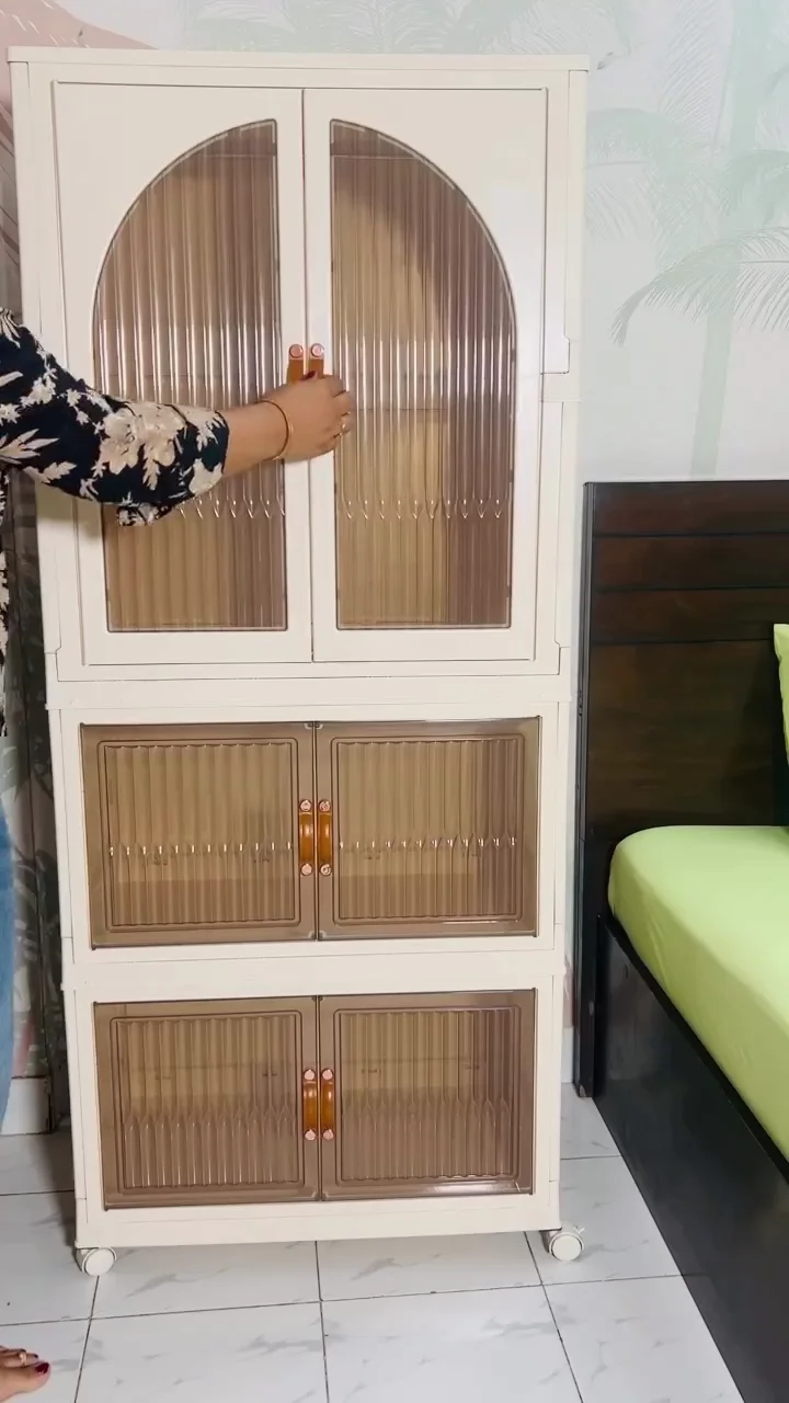 Multi-Tiered Luxury Mobile Wardrobe and Storage Cabinet with Arched Fluted Doors, Integrated Lighting, and Foldable Space-Saving Design